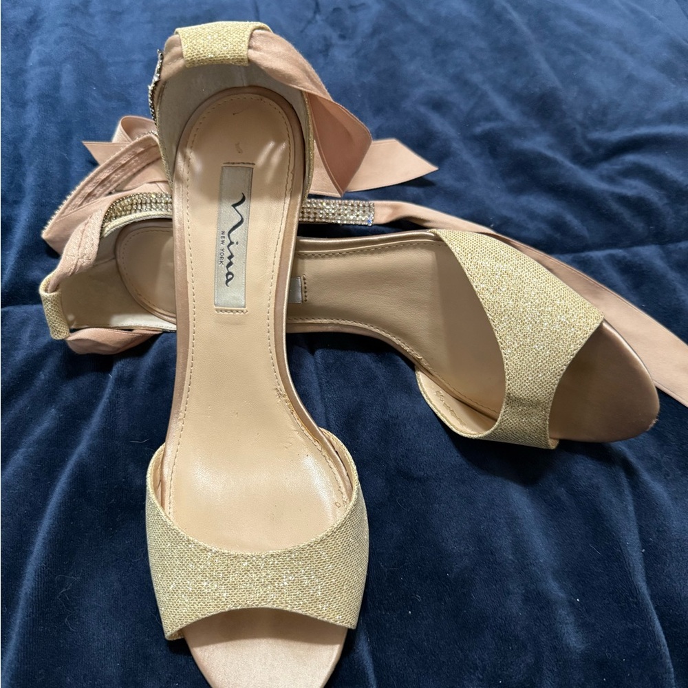 Gold-tone half-heeled sandals by Nina
Worn once to a wedding party
Size 9
